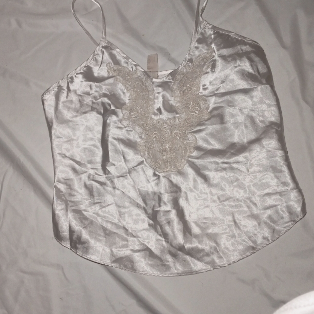 White top with white flower embroidery
